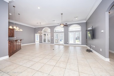 Located in a prestigious gated golf course community, this on Shell Landing Golf Club in Mississippi - for sale on GolfHomes.com, golf home, golf lot