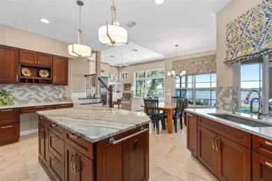 This luxurious estate sits on an amazing lakefront lot on a on Windermere Country Club in Florida - for sale on GolfHomes.com, golf home, golf lot