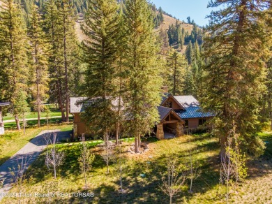 Welcome to a stunning residence nestled within the prestigious on Snake River Sporting Club in Wyoming - for sale on GolfHomes.com, golf home, golf lot