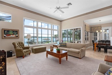 This luxurious estate sits on an amazing lakefront lot on a on Windermere Country Club in Florida - for sale on GolfHomes.com, golf home, golf lot