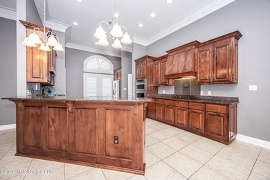 Located in a prestigious gated golf course community, this on Shell Landing Golf Club in Mississippi - for sale on GolfHomes.com, golf home, golf lot