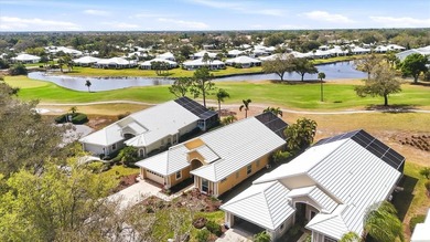 Impeccably appointed pool home on the Bobcat Course, hole #2, in on Plantation Golf and Country Club in Florida - for sale on GolfHomes.com, golf home, golf lot
