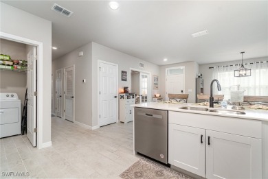 Welcome to Your Dream Villa on the Beautiful Golf Course Fairway on Herons Glen Golf and Country Club in Florida - for sale on GolfHomes.com, golf home, golf lot