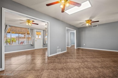 Come experience all that Sun City has to offer.  This home boast on Sun City Lakes West and East in Arizona - for sale on GolfHomes.com, golf home, golf lot