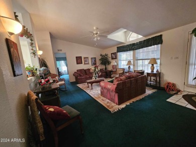 This charming 1995 Palm Harbor home, located in the vibrant 55+ on Pine Shadows Golf Course in Arizona - for sale on GolfHomes.com, golf home, golf lot