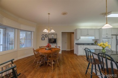 Tucked at the end of a quiet street in Innsbrook, this charming on Innsbrook Resort Golf Course in Missouri - for sale on GolfHomes.com, golf home, golf lot