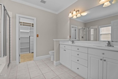 Live the Lake Life every day! This beautifully designed home on River Golf and Country Club at Lake Royale in North Carolina - for sale on GolfHomes.com, golf home, golf lot