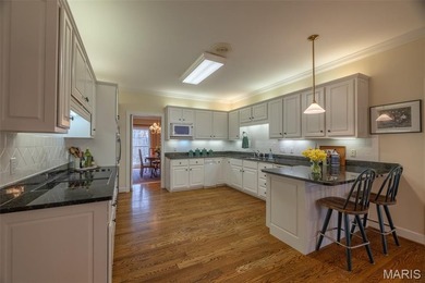 Tucked at the end of a quiet street in Innsbrook, this charming on Innsbrook Resort Golf Course in Missouri - for sale on GolfHomes.com, golf home, golf lot