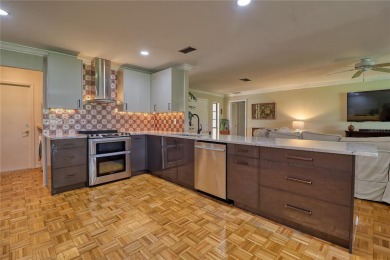 This home is a Head Turner, You are welcomed by the grand double on Palm Aire Country Club of Sarasota in Florida - for sale on GolfHomes.com, golf home, golf lot