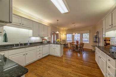 Tucked at the end of a quiet street in Innsbrook, this charming on Innsbrook Resort Golf Course in Missouri - for sale on GolfHomes.com, golf home, golf lot