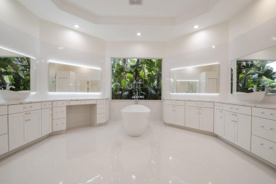 With more than 5,300 square feet under air, this Ecclestone on PGA National Estates Golf Course in Florida - for sale on GolfHomes.com, golf home, golf lot