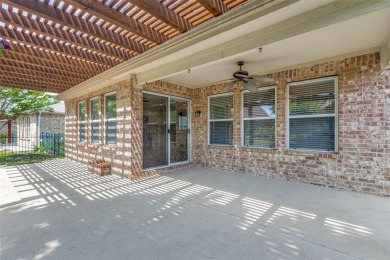 Charming single-story and sought-after Pine Springs floor plan on Frisco Lakes Golf Course in Texas - for sale on GolfHomes.com, golf home, golf lot