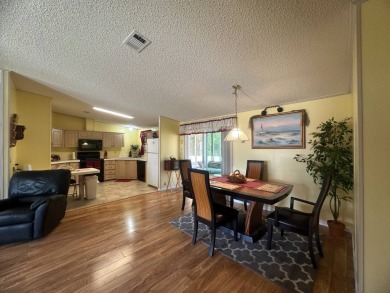 This beautiful partially furnished home with a golf cart on Lake Fairways Country Club in Florida - for sale on GolfHomes.com, golf home, golf lot