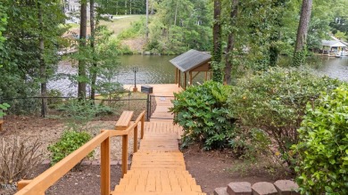 Live the Lake Life every day! This beautifully designed home on River Golf and Country Club at Lake Royale in North Carolina - for sale on GolfHomes.com, golf home, golf lot