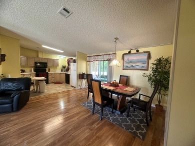 This beautiful partially furnished home with a golf cart on Lake Fairways Country Club in Florida - for sale on GolfHomes.com, golf home, golf lot
