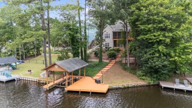 Live the Lake Life every day! This beautifully designed home on River Golf and Country Club at Lake Royale in North Carolina - for sale on GolfHomes.com, golf home, golf lot