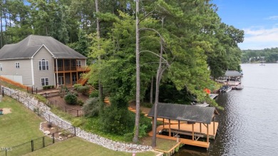 Live the Lake Life every day! This beautifully designed home on River Golf and Country Club at Lake Royale in North Carolina - for sale on GolfHomes.com, golf home, golf lot