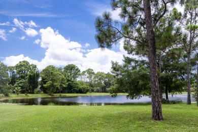 With more than 5,300 square feet under air, this Ecclestone on PGA National Estates Golf Course in Florida - for sale on GolfHomes.com, golf home, golf lot