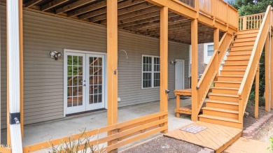 Live the Lake Life every day! This beautifully designed home on River Golf and Country Club at Lake Royale in North Carolina - for sale on GolfHomes.com, golf home, golf lot