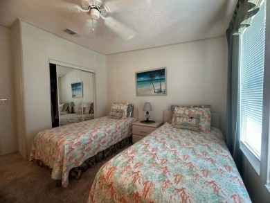 This beautiful partially furnished home with a golf cart on Lake Fairways Country Club in Florida - for sale on GolfHomes.com, golf home, golf lot