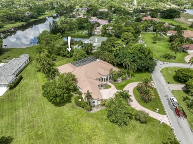 With more than 5,300 square feet under air, this Ecclestone on PGA National Estates Golf Course in Florida - for sale on GolfHomes.com, golf home, golf lot