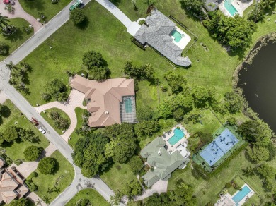 With more than 5,300 square feet under air, this Ecclestone on PGA National Estates Golf Course in Florida - for sale on GolfHomes.com, golf home, golf lot