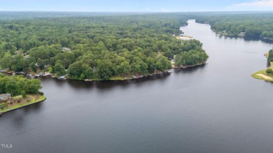 Live the Lake Life every day! This beautifully designed home on River Golf and Country Club at Lake Royale in North Carolina - for sale on GolfHomes.com, golf home, golf lot