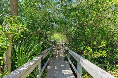 Welcome to a rare and remarkable offering in the exclusive on Colliers Reserve Country Club in Florida - for sale on GolfHomes.com, golf home, golf lot