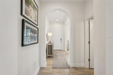 This better-than-new, 2-bedroom plus den/office, 2.5-bath on Sarasota National Golf Club in Florida - for sale on GolfHomes.com, golf home, golf lot