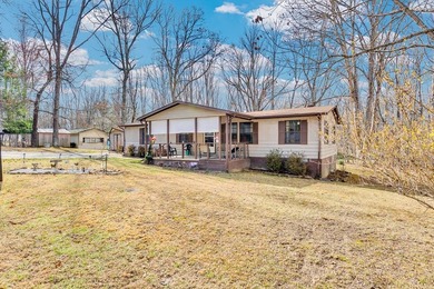 A charming and thoughtfully updated 3-bedroom, 2-bath home on a on Stonehenge Golf Course in Tennessee - for sale on GolfHomes.com, golf home, golf lot
