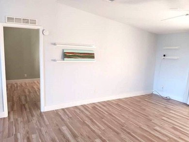 Discover carefree living in this beautiful 2-bedroom, 2-bath on Four Lakes Golf Club in Florida - for sale on GolfHomes.com, golf home, golf lot