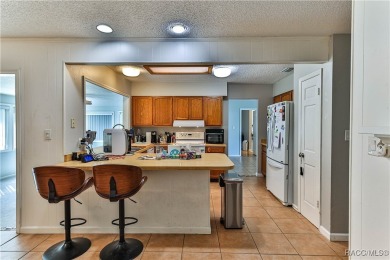 This spacious 3-bedroom 2-bath home is located in the heart of on Plantation Inn and Golf Resort  in Florida - for sale on GolfHomes.com, golf home, golf lot