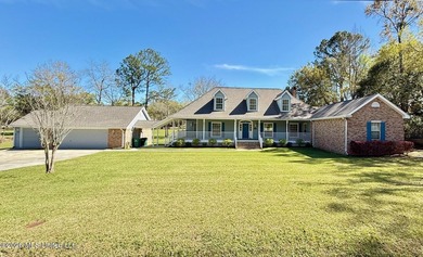 Perfectly positioned on a double lot along the Pine Golf on Diamondhead Country Club in Mississippi - for sale on GolfHomes.com, golf home, golf lot