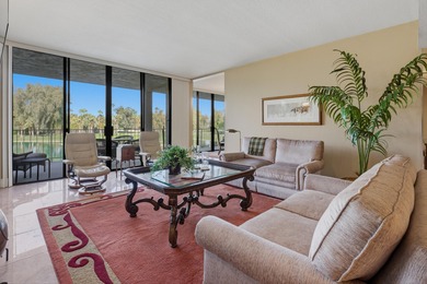 Serene Lakefront Views through 9-ft walls of windows. Lots of on Desert Island Golf and Country Club in California - for sale on GolfHomes.com, golf home, golf lot