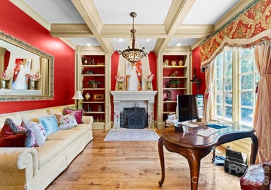 This custom estate embodies luxury, privacy, and timeless on The Palisades Country Club in North Carolina - for sale on GolfHomes.com, golf home, golf lot