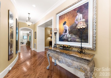 This custom estate embodies luxury, privacy, and timeless on The Palisades Country Club in North Carolina - for sale on GolfHomes.com, golf home, golf lot