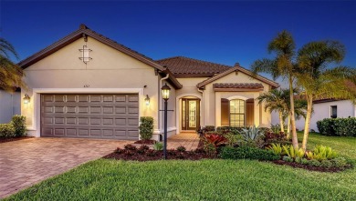 Under contract-accepting backup offers. Incredibly custom and on Esplanade Golf and Country at Lakewood Ranch in Florida - for sale on GolfHomes.com, golf home, golf lot