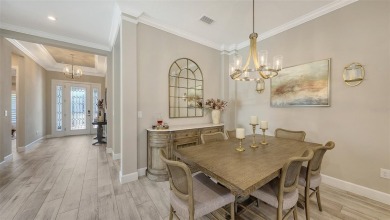 Under contract-accepting backup offers. Incredibly custom and on Esplanade Golf and Country at Lakewood Ranch in Florida - for sale on GolfHomes.com, golf home, golf lot