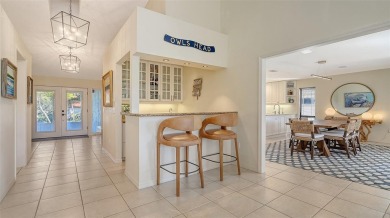 Coastal elegance meets island living in Bay Isles Bayou on on Longboat Key Golf Club Resort in Florida - for sale on GolfHomes.com, golf home, golf lot
