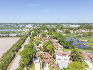 The IMG golf course is just steps away from this large 3-bedroom on IMG Academies Golf and Country Club in Florida - for sale on GolfHomes.com, golf home, golf lot