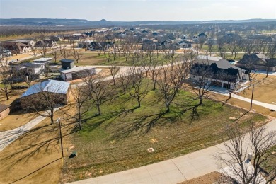 Exclusive Country Club living!  This lot is located in the on Pecan Plantation Country Club in Texas - for sale on GolfHomes.com, golf home, golf lot