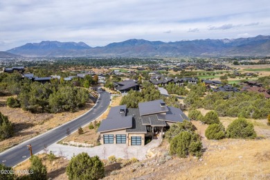 Experience contemporary mountain living in this 5,391 sq ft home on Red Ledges Golf Club in Utah - for sale on GolfHomes.com, golf home, golf lot