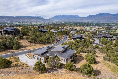 Experience contemporary mountain living in this 5,391 sq ft home on Red Ledges Golf Club in Utah - for sale on GolfHomes.com, golf home, golf lot
