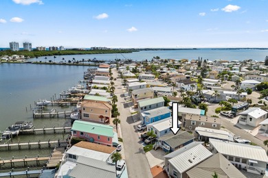 Charming and renovated, this 2-bedroom, 1-bath retreat is on Island Dunes Country Club in Florida - for sale on GolfHomes.com, golf home, golf lot