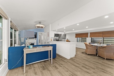 Charming and renovated, this 2-bedroom, 1-bath retreat is on Island Dunes Country Club in Florida - for sale on GolfHomes.com, golf home, golf lot