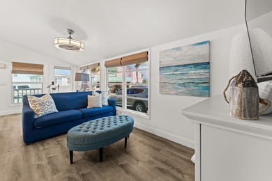 Charming and renovated, this 2-bedroom, 1-bath retreat is on Island Dunes Country Club in Florida - for sale on GolfHomes.com, golf home, golf lot