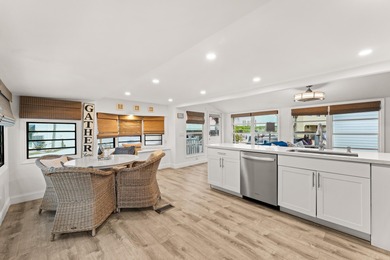 Charming and renovated, this 2-bedroom, 1-bath retreat is on Island Dunes Country Club in Florida - for sale on GolfHomes.com, golf home, golf lot