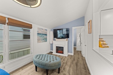 Charming and renovated, this 2-bedroom, 1-bath retreat is on Island Dunes Country Club in Florida - for sale on GolfHomes.com, golf home, golf lot