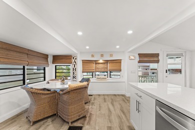 Charming and renovated, this 2-bedroom, 1-bath retreat is on Island Dunes Country Club in Florida - for sale on GolfHomes.com, golf home, golf lot