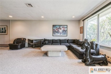 Just over 1000 sq ft, this cozy Timberline floor plan with 2b/2b on Clearbrook Golf Club in New Jersey - for sale on GolfHomes.com, golf home, golf lot